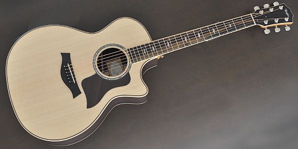 TAYLORが独自に開発したEXPRESSION SYSTEMにより、歪みのないクリアーなサウンドを実現。グランド・オーディトリアムのコンパクトなボディによるレスポンスの良さに加え、インディアンローズウッドの艶やかな倍音も加わった美しいサウンドを堪能できます。 ■アコースティックキター ■カラー：ナチュラル ■トップ：シトカ・スプルース ■サイド/バック：インディアン・ローズウッド ■ネック：マホガニー ■指板：エボニー ■ナット幅：44.5mm ■ブリッジ：エボニー ■エレクトロ