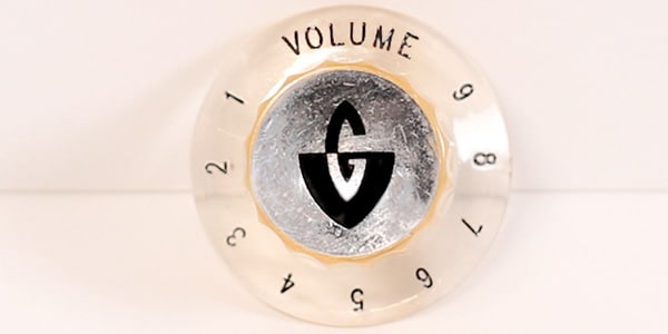 GUILD/Newark St. Collection Volume Knob Amber Silver Top